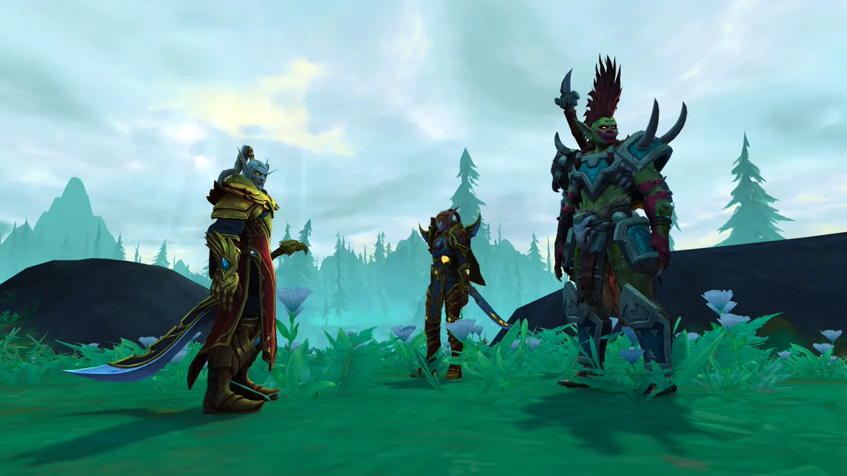 Tiga karakter campaign The Promise of Tomorrow berdiri di padang rumput berkabut: dua blood elf dan satu troll Amani
